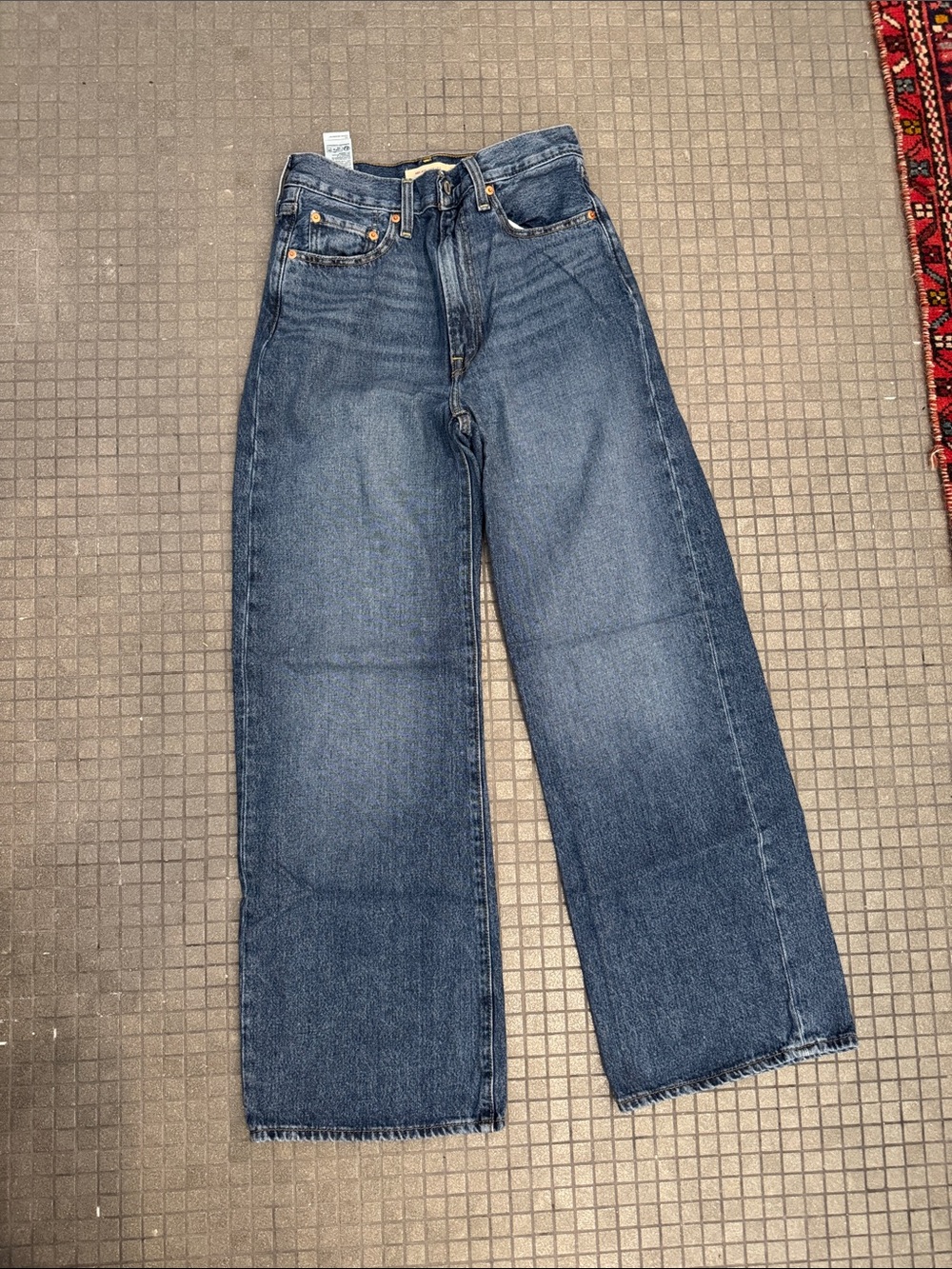 Levi’s ribcage wide leg full length medium blue jeans 27 w